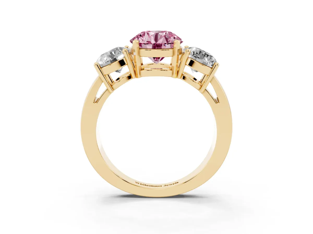 Fancy Pink Three-Stone Round Cut Diamond Ring with Round Side Stones, Classic Band, and Four-Prong Setting Yellow gold