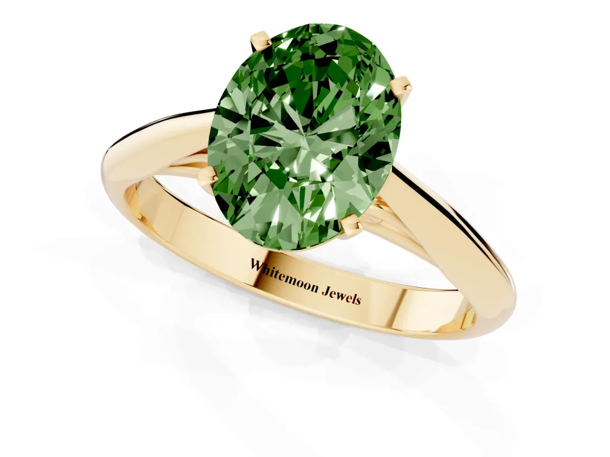 Fancy Green Oval Cut Diamond Solitaire Engagement Ring with Cathedral Setting and Four-Prong Mount Yellow gold