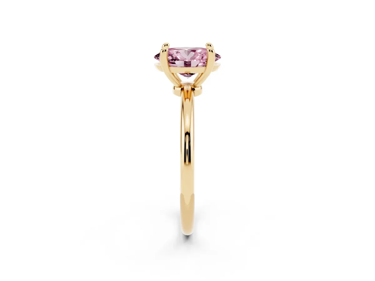 Fancy Pink Oval Cut Solitaire Diamond Ring with 4-Prong Setting on a Classic Band Yellow gold