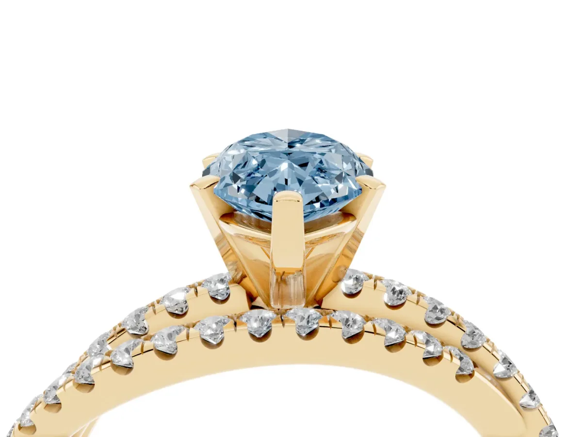 Fancy Blue Marquise Cut Solitaire Twist Band with Pavé Setting and Four-Prong Setting Yellow gold