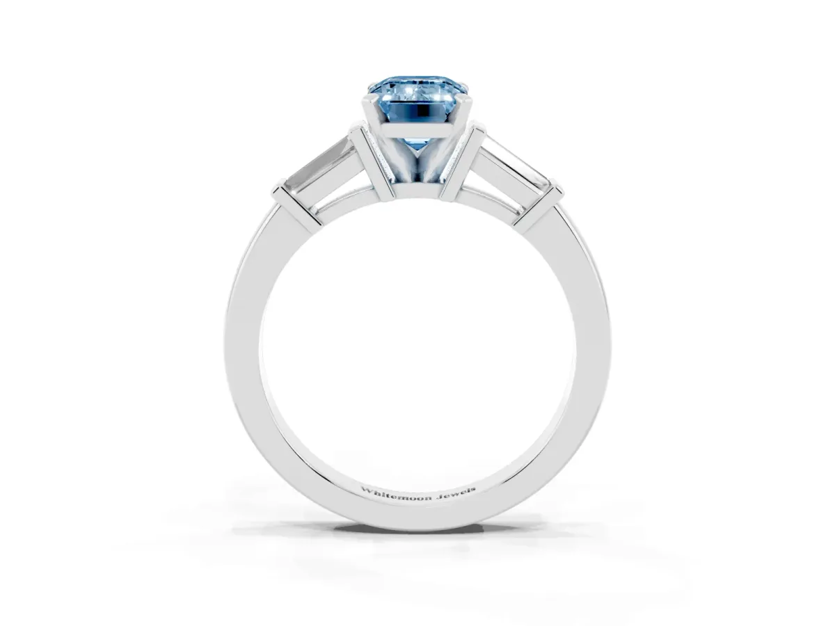 Fancy Blue Emerald Cut Cut Diamond Solitaire Ring with Tapered Baguette Accents and Four-Prong Setting Silver