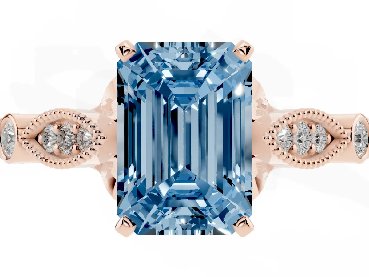 Fancy Blue Emerald Cut Cut Diamond with Milgrain Marquise and Bezel Accents on a Solitaire Band with Prong Setting Rose gold