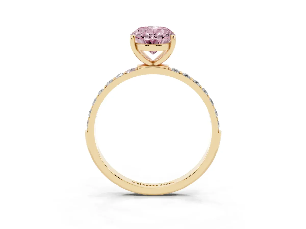 Fancy Pink Oval Cut Diamond Solitaire Ring with Round Pavé Shoulders and Prong Setting Yellow gold