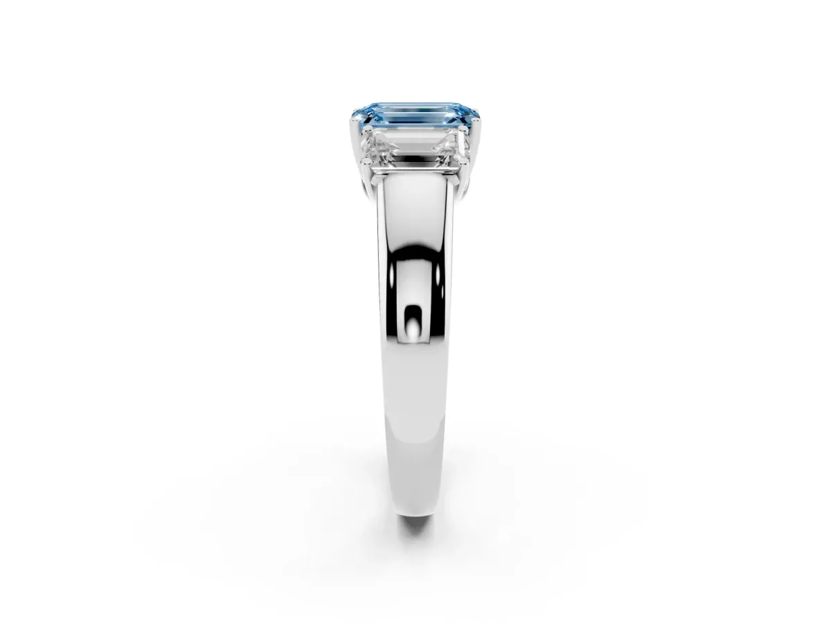 Fancy Blue Three-Stone Emerald Cut Cut Diamond Ring with Prong Setting and Classic Band Silver