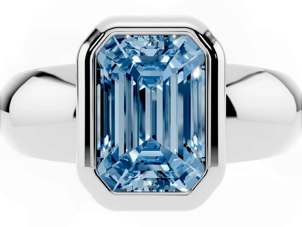 Fancy Blue Bezel Set Emerald Cut Solitaire Ring with Wide Band Platinum
