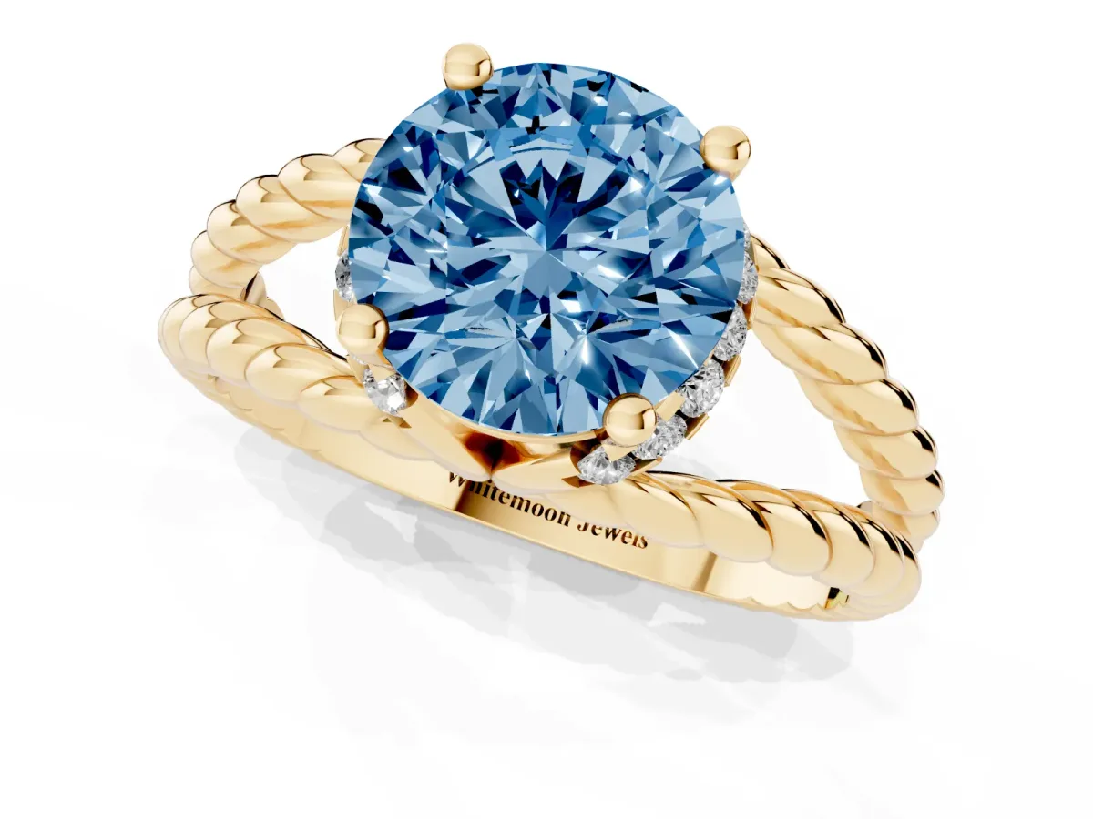 Fancy Blue Round Cut Halo Twisted Band Four-Prong Ring Yellow gold