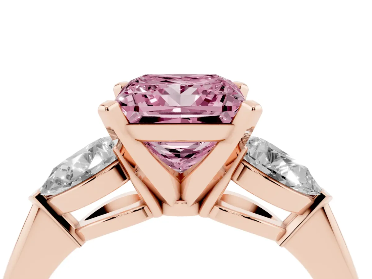 Fancy Pink Three-Stone Princess Cut Diamond Ring with Pear Side Stones and Four-Prong Setting Rose gold
