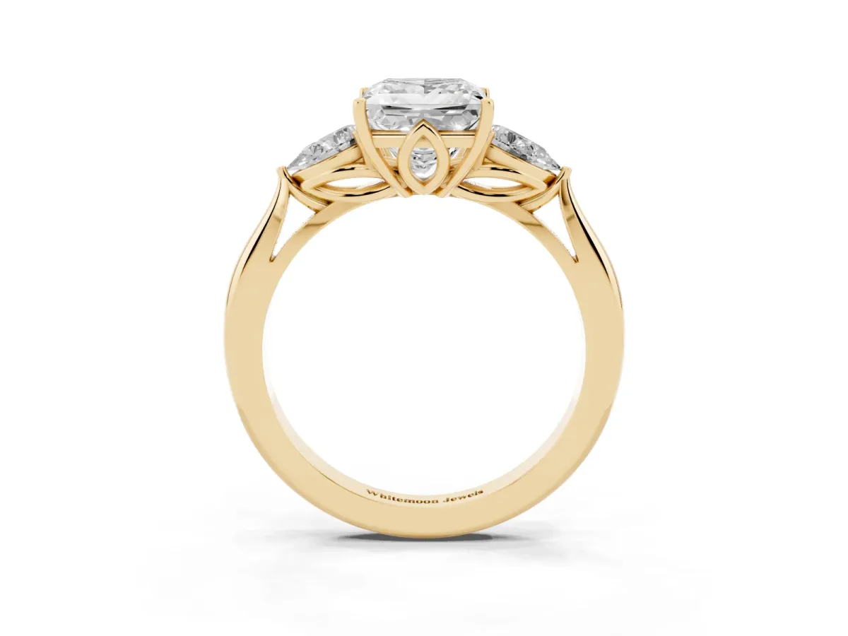Three-Stone Princess Cut Diamond Ring with Pear Side Stones in Four-Prong Setting Yellow gold
