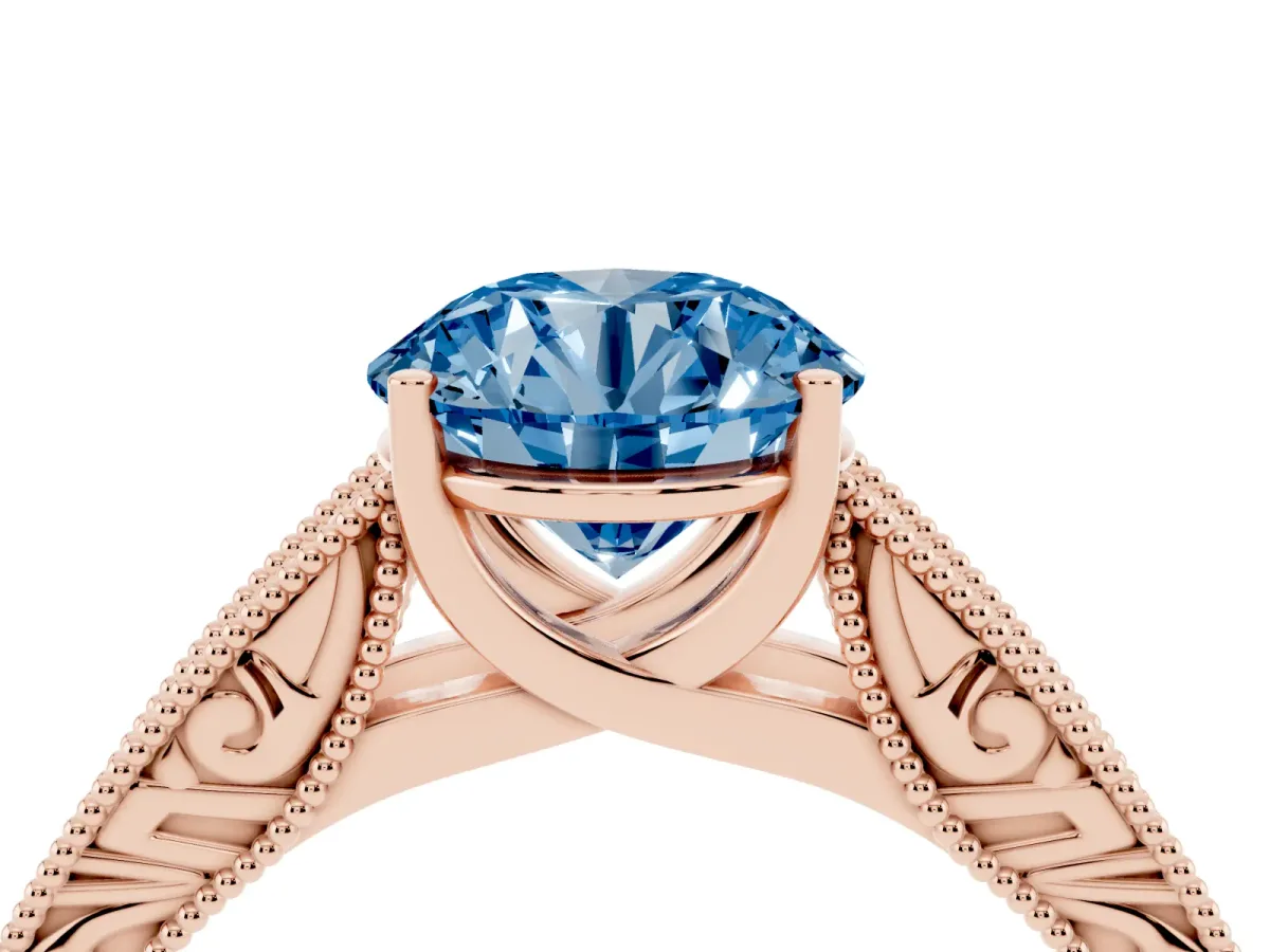 Fancy Blue Round Cut Diamond Solitaire Ring with Engraved Band and Four-Prong Setting Rose gold