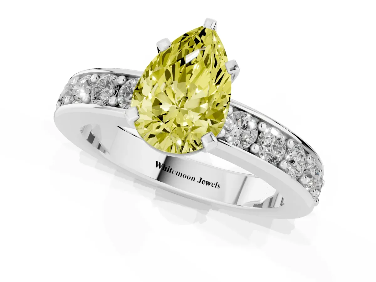 Fancy Yellow Pear Cut Diamond Engagement Ring with Channel Set Round Band and Prong Setting Silver