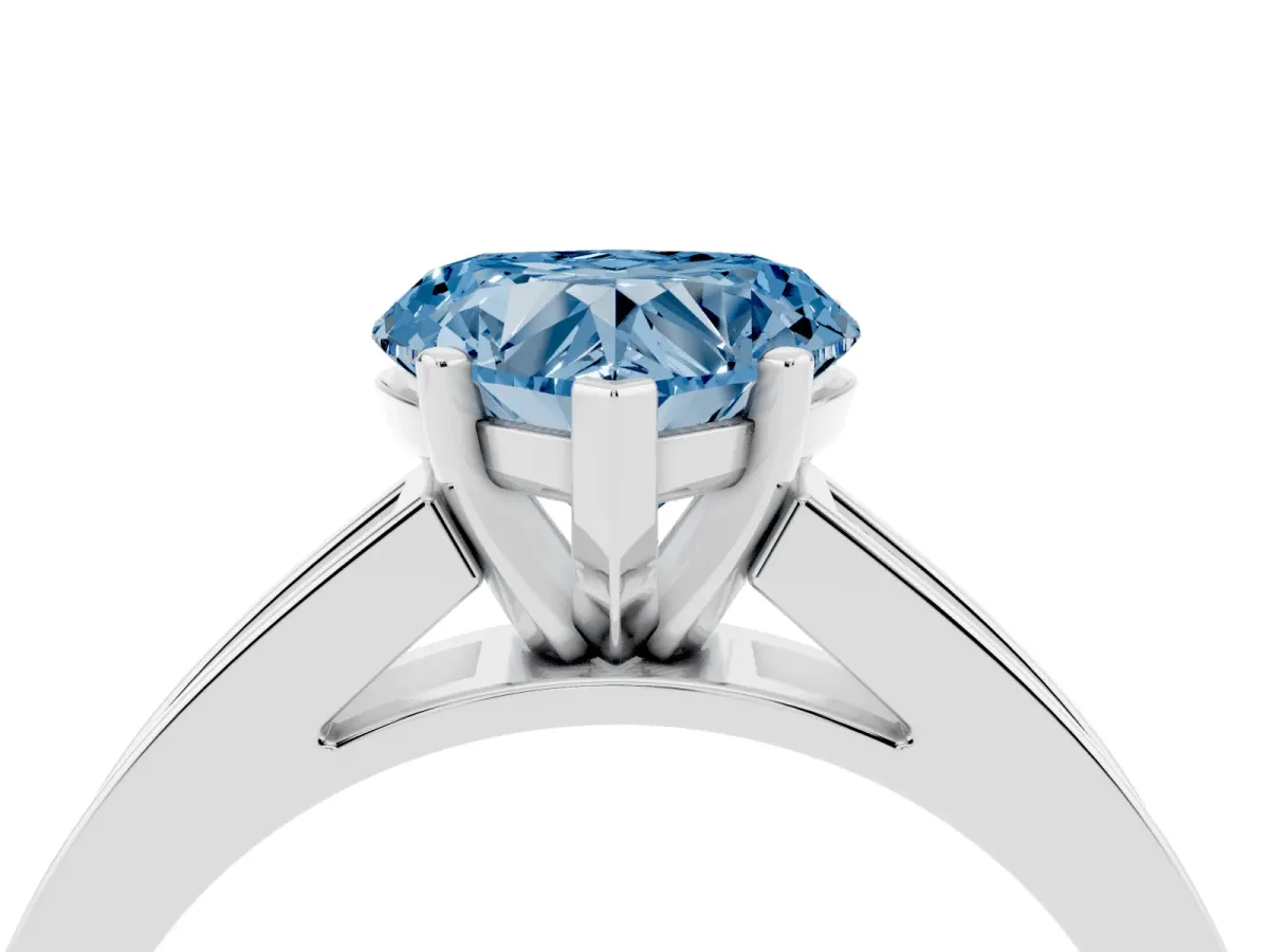 Fancy Blue Heart Cut Solitaire Diamond Ring with Channel-Set Band and Four-Prong Setting Silver