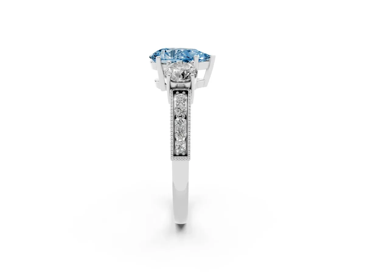 Fancy Blue Pear Cut Three-Stone Diamond Ring with Pavé Band and Four-Prong Setting Silver
