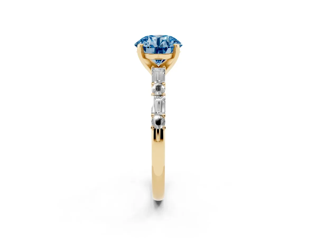 Fancy Blue Round Cut Diamond Solitaire with Side Baguettes and Channel Set Band Yellow gold