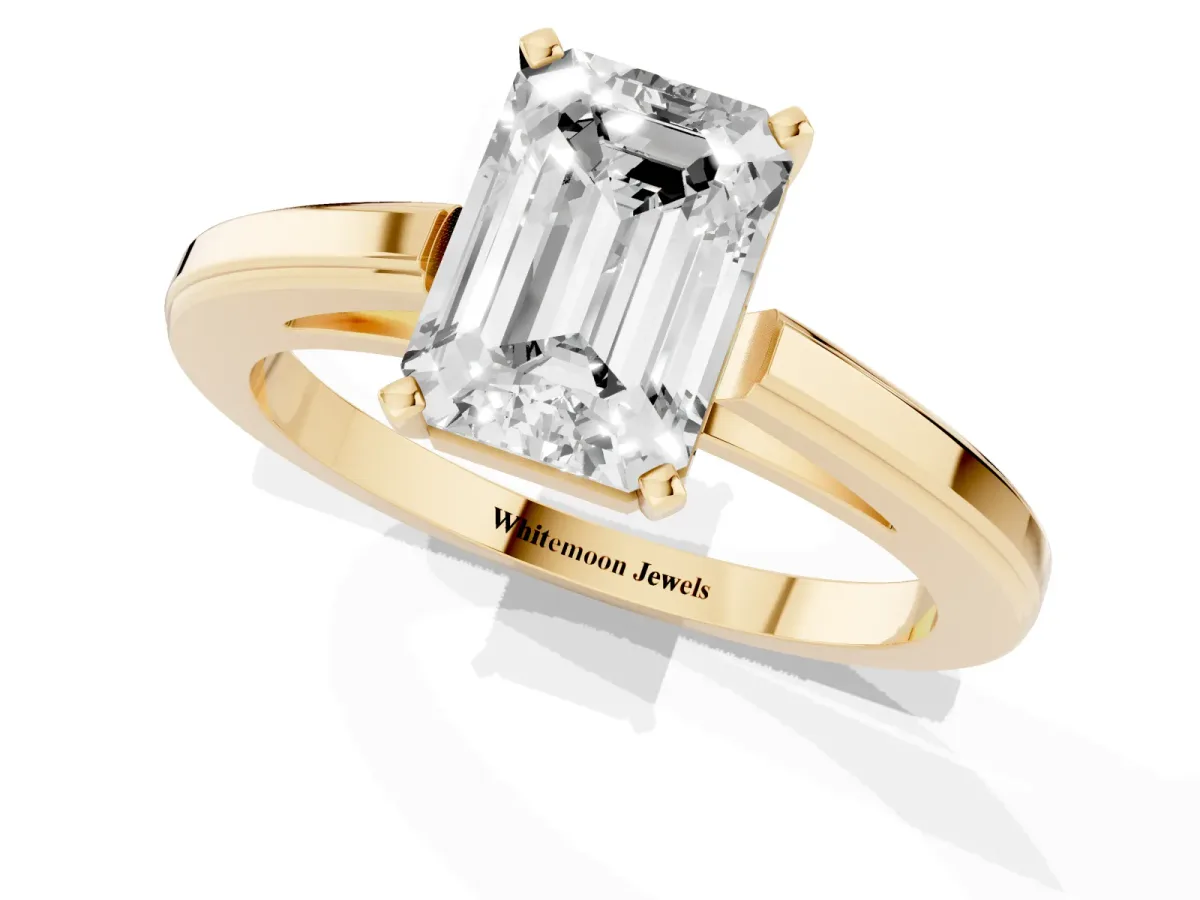 Emerald Cut Solitaire Diamond Ring with Four-Prong Setting and Classic Band Yellow gold