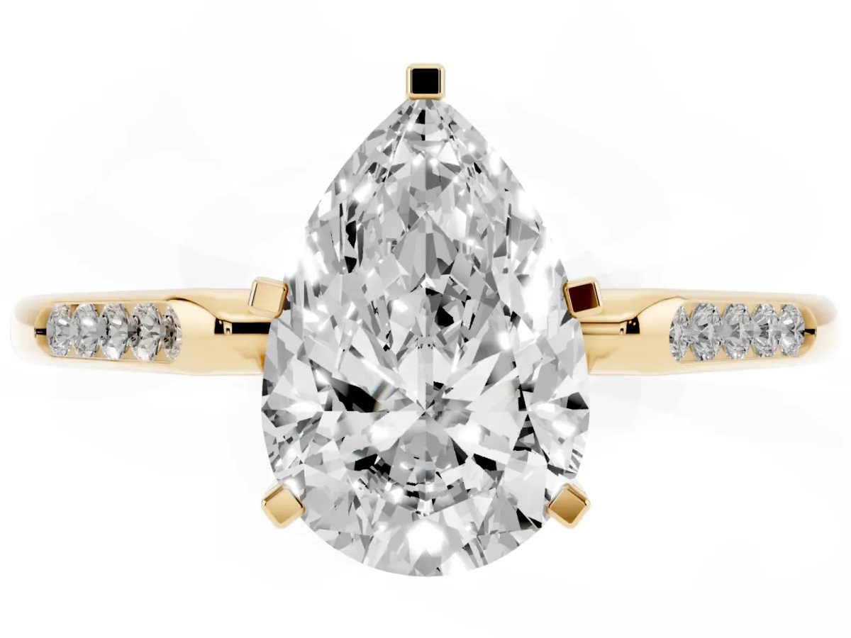 Pear Cut Diamond Solitaire Ring with Channel Set Round Band and Prong Setting Yellow gold