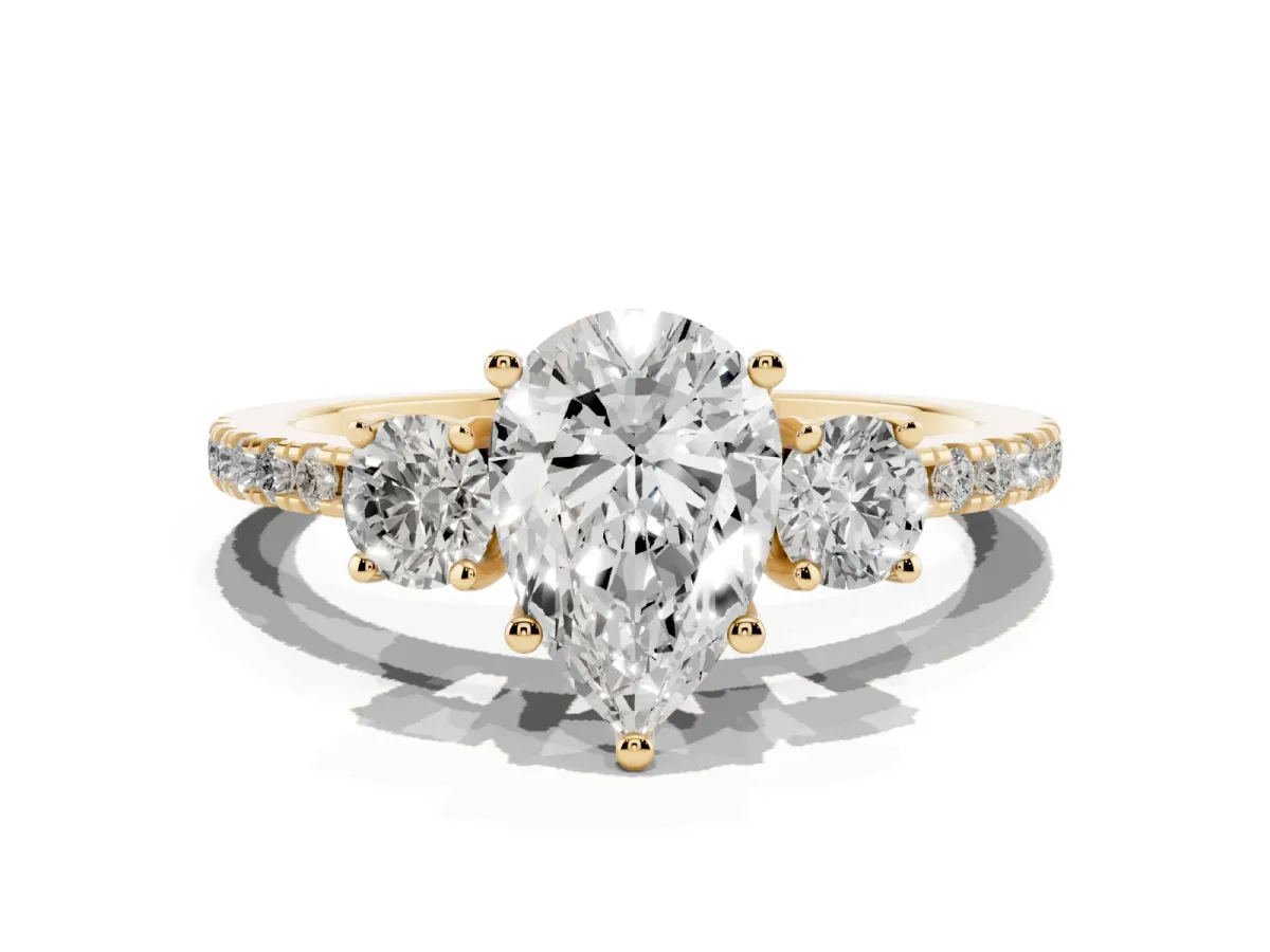 Three-Stone Pear Cut Cut Diamond Pavé Band with Prong Setting Yellow gold