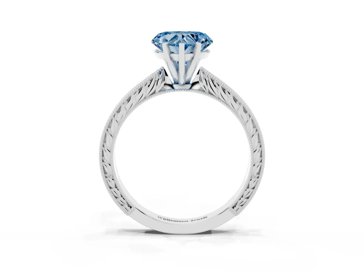 Fancy Blue Heart Cut Solitaire Milgrain Engraved Band with Four-Prong Setting Platinum