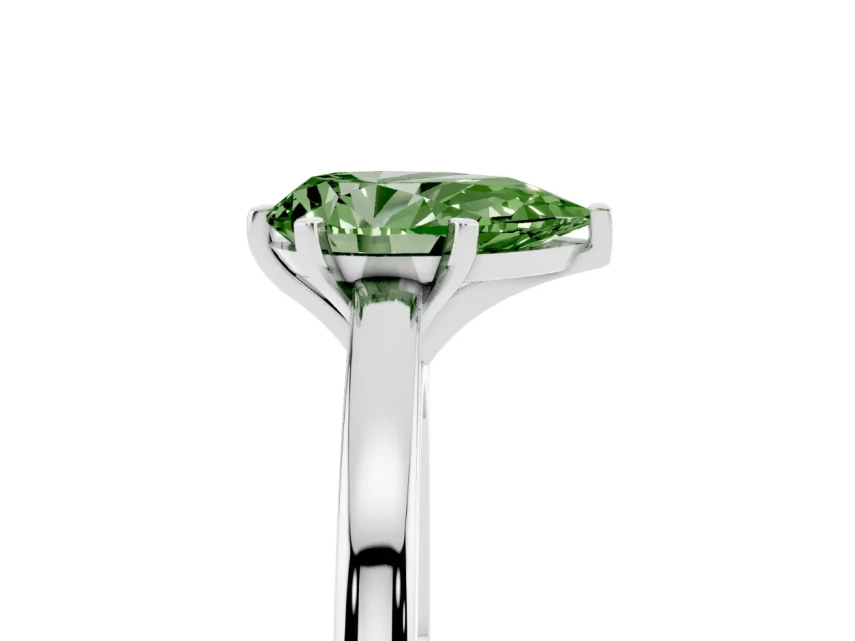 Fancy Green Pear Cut Solitaire Diamond Engagement Ring with Four-Prong Setting on a Classic Band Silver