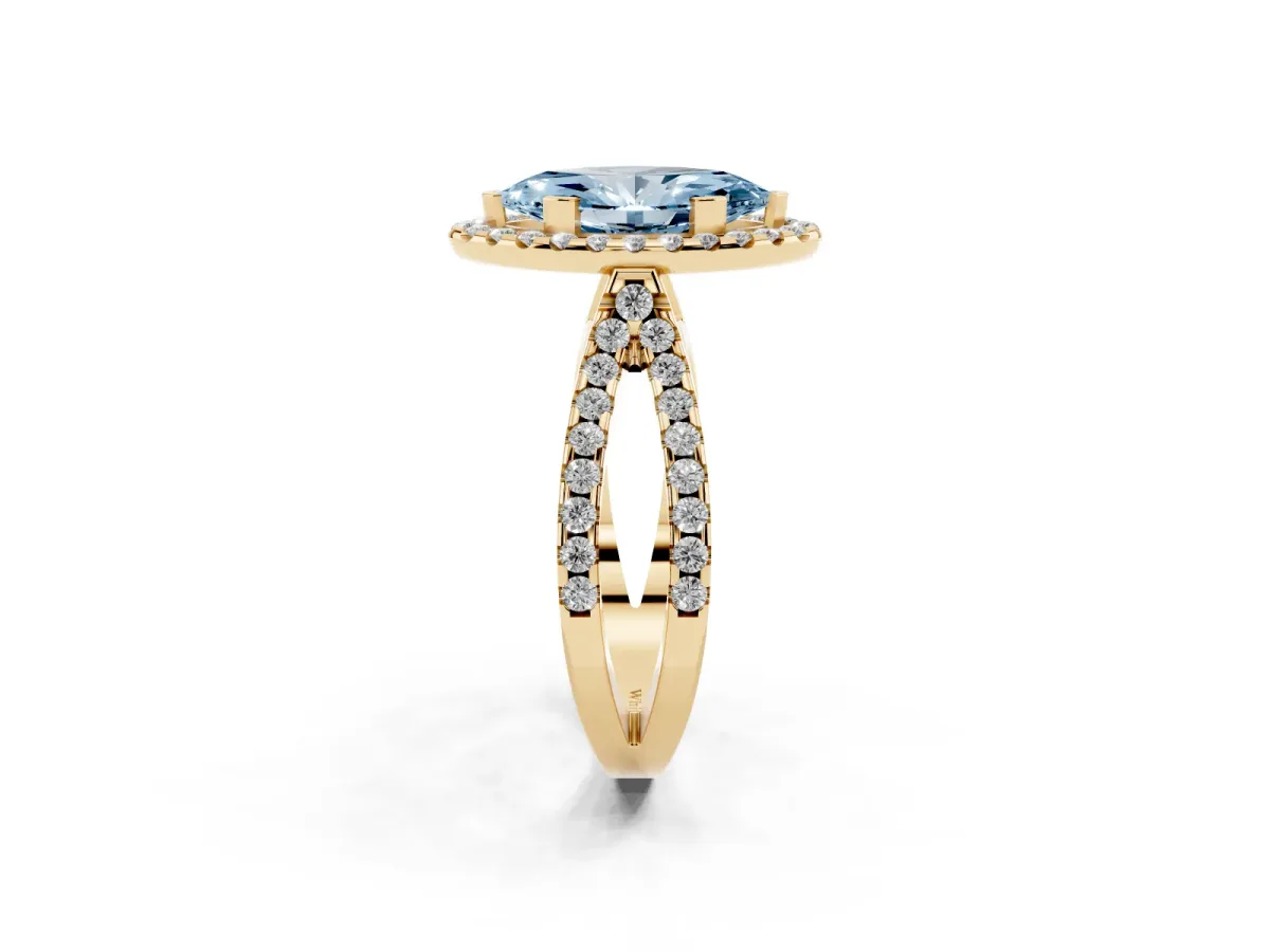 Fancy Blue Marquise Cut Diamond Halo Ring with Split Shank Pavé Band and Prong Setting Yellow gold