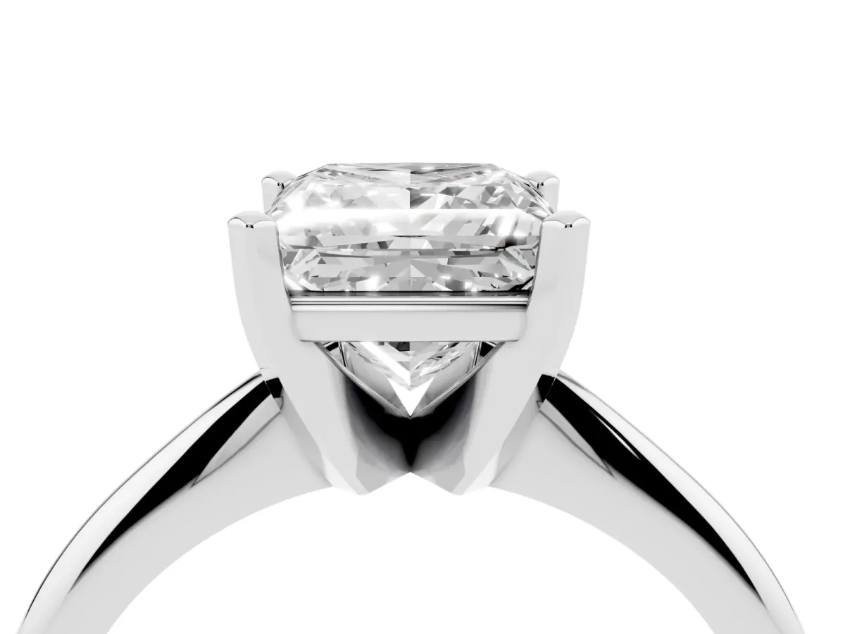Princess Cut Cut Solitaire Ring with Four-Prong Setting on a Classic Band Platinum