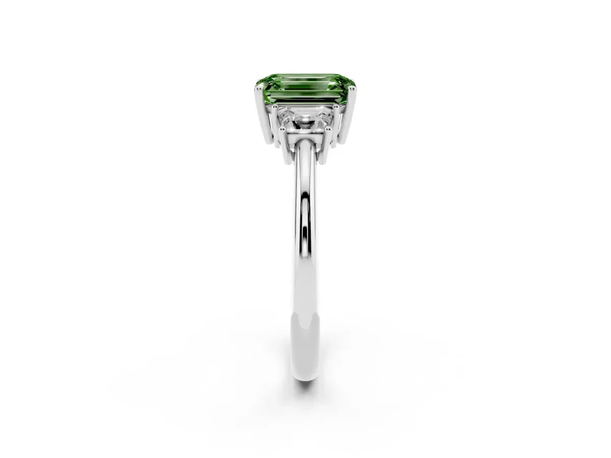 Fancy Green Emerald Cut Diamond Three-Stone Ring with Trapezoid Side Stones and Prong Setting Silver
