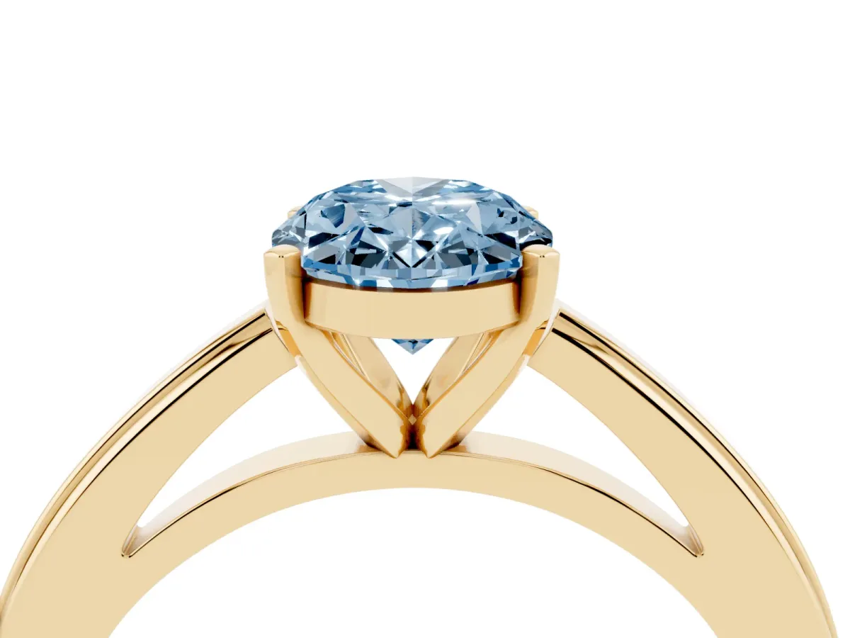 Fancy Blue Oval Cut Solitaire Diamond Ring with Four-Prong Setting and Classic Band Yellow gold