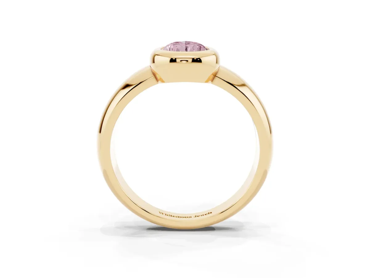 Fancy Pink Bezel Set Pear Cut Solitaire Ring with Wide Band Yellow gold