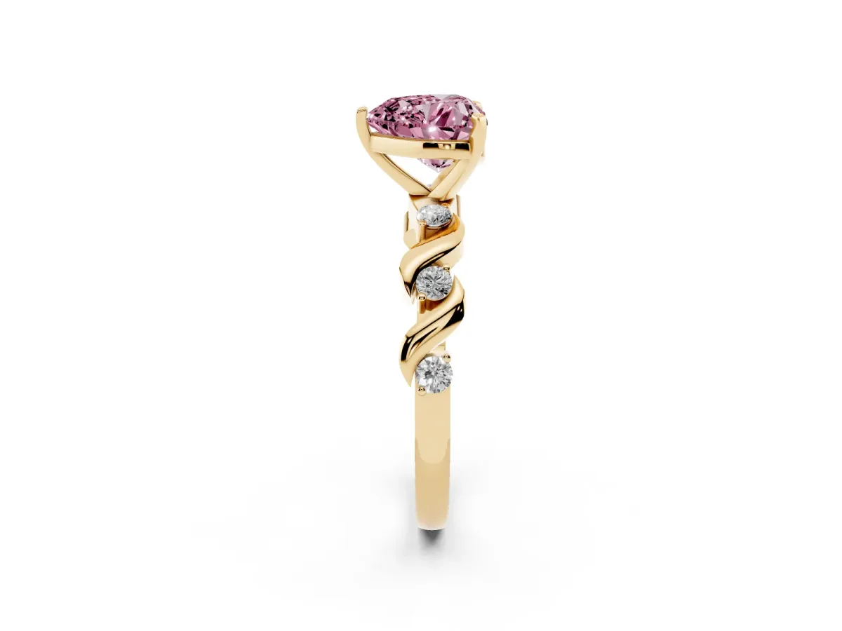 Fancy Pink Heart Cut Diamond Solitaire Twisted Band with Round Accents and Prong Setting Yellow gold