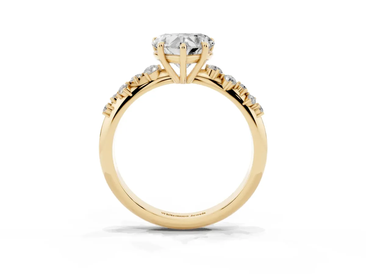 Heart Cut Diamond Cluster Side Stone Solitaire Ring with Prong Setting Yellow gold