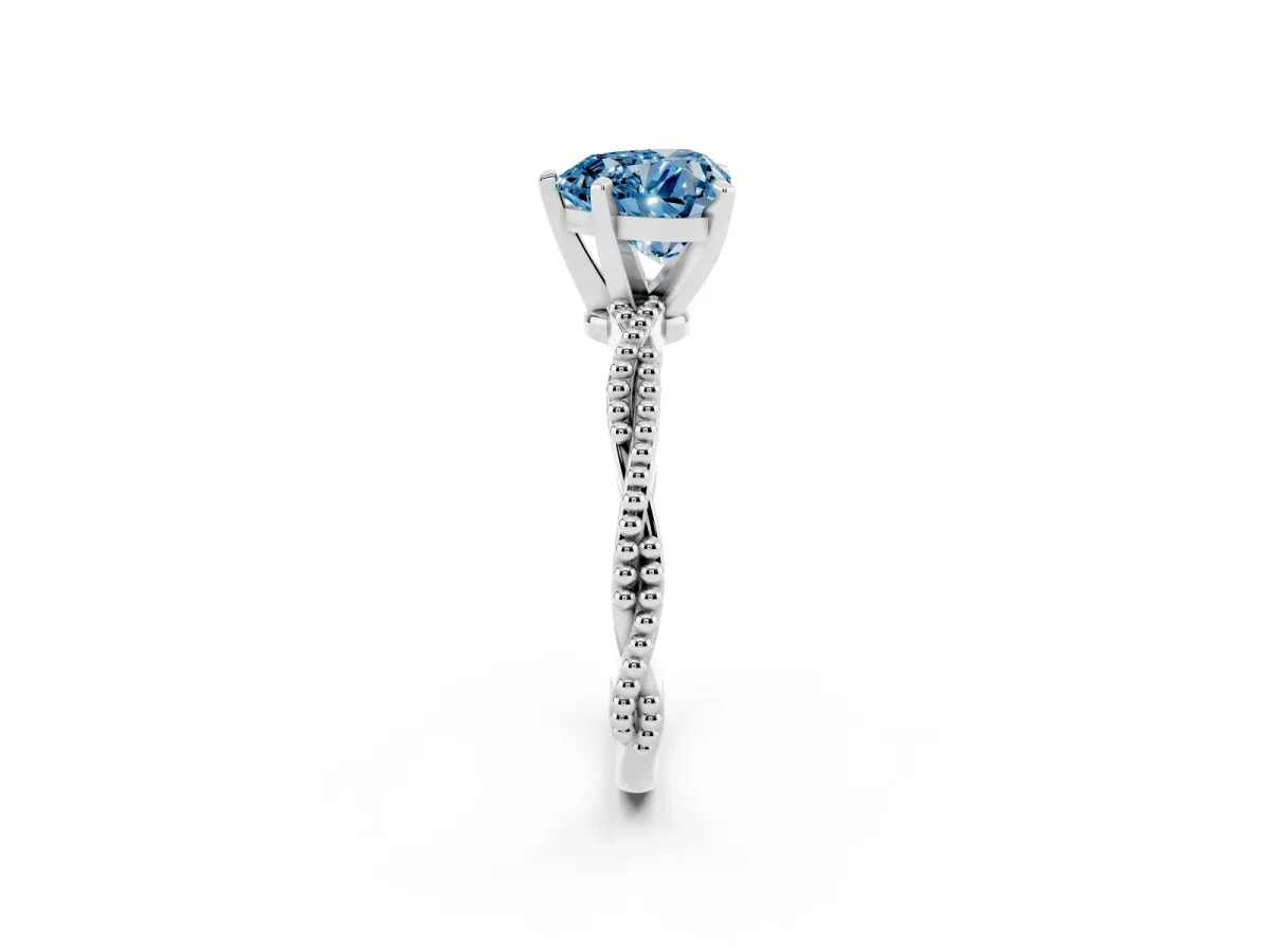 Fancy Blue Heart Cut Solitaire Twisted Band with Bead Prong Setting Platinum