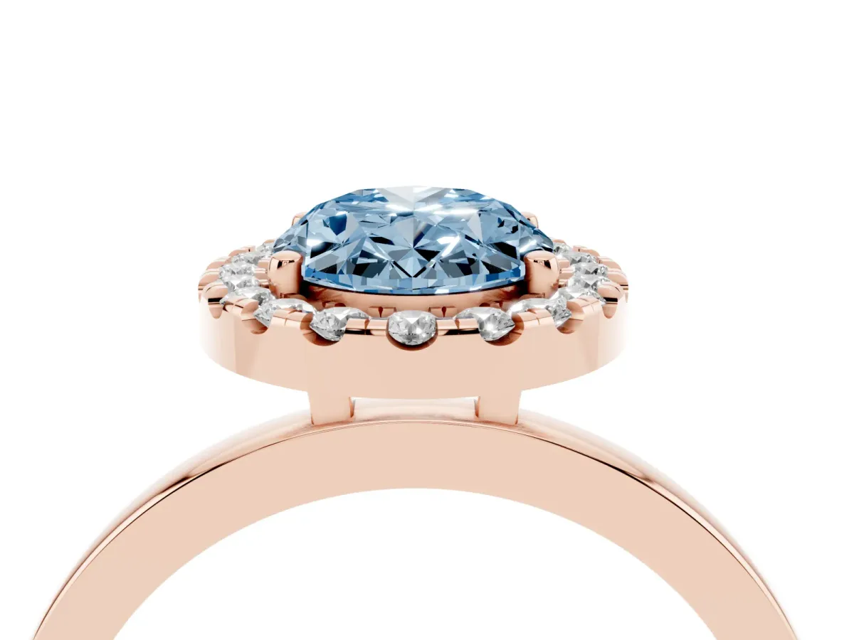 Fancy Blue Oval Cut Halo Diamond Solitaire with Pavé Band and Four-Prong Setting Rose gold