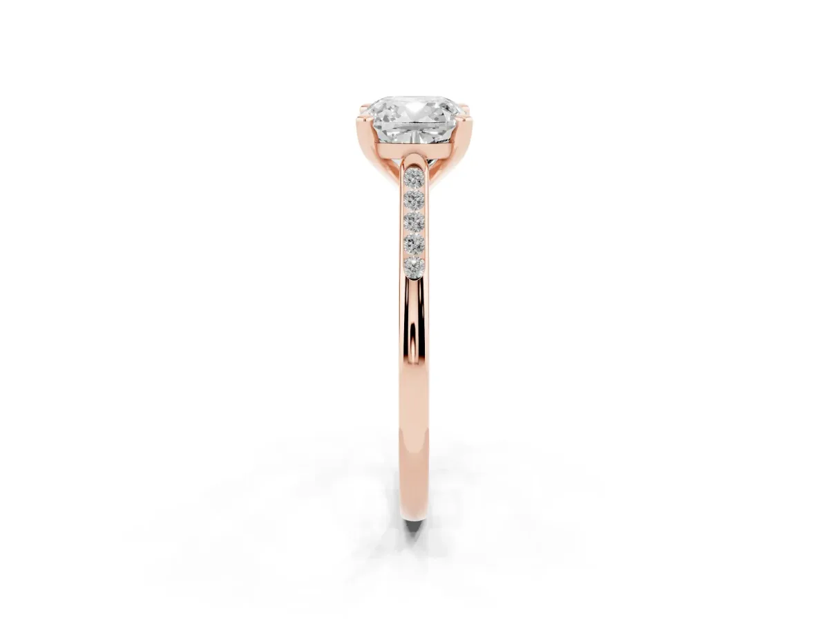 Cushion Cut Diamond Solitaire Ring with Channel Set Round Band and Prong Setting Rose gold