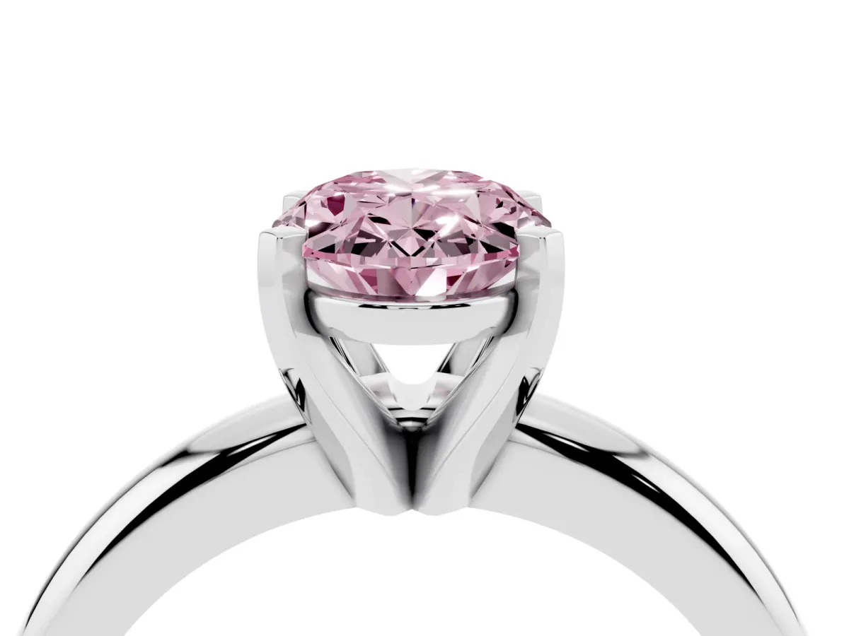 Fancy Pink Oval Cut Diamond Solitaire Engagement Ring with Round Band and Four-Prong Setting Platinum