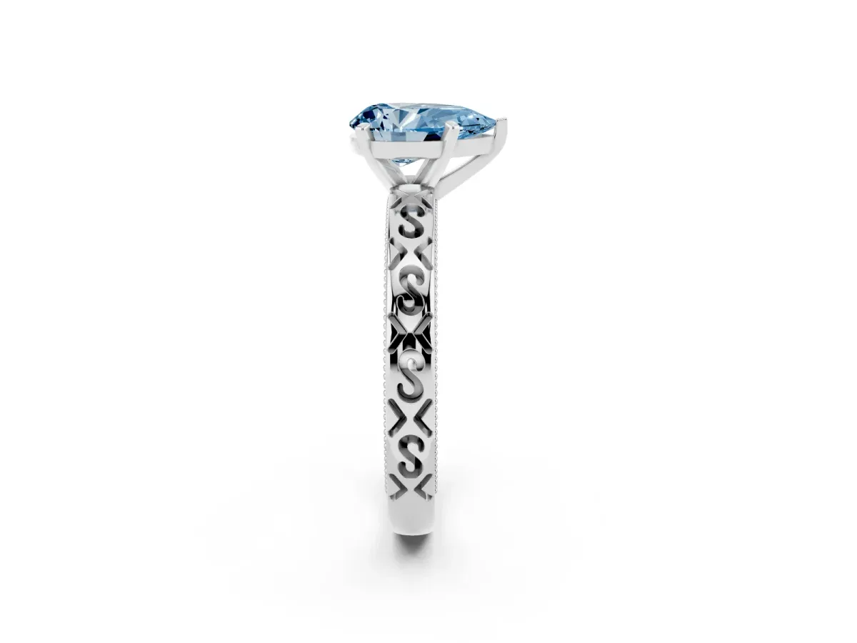 Fancy Blue Pear Cut Solitaire Engagement Ring with Scrollwork Band and Four-Prong Setting Silver