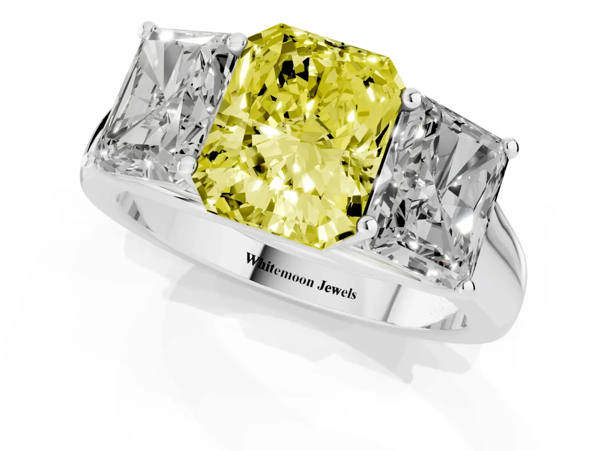 Fancy Yellow Radiant Cut Three-Stone Diamond Ring with Prong Setting on a Classic Band Silver