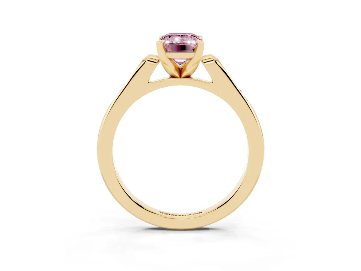 Fancy Pink Emerald Cut Diamond Solitaire Ring with Channel Set Round Band and Prong Setting Yellow gold