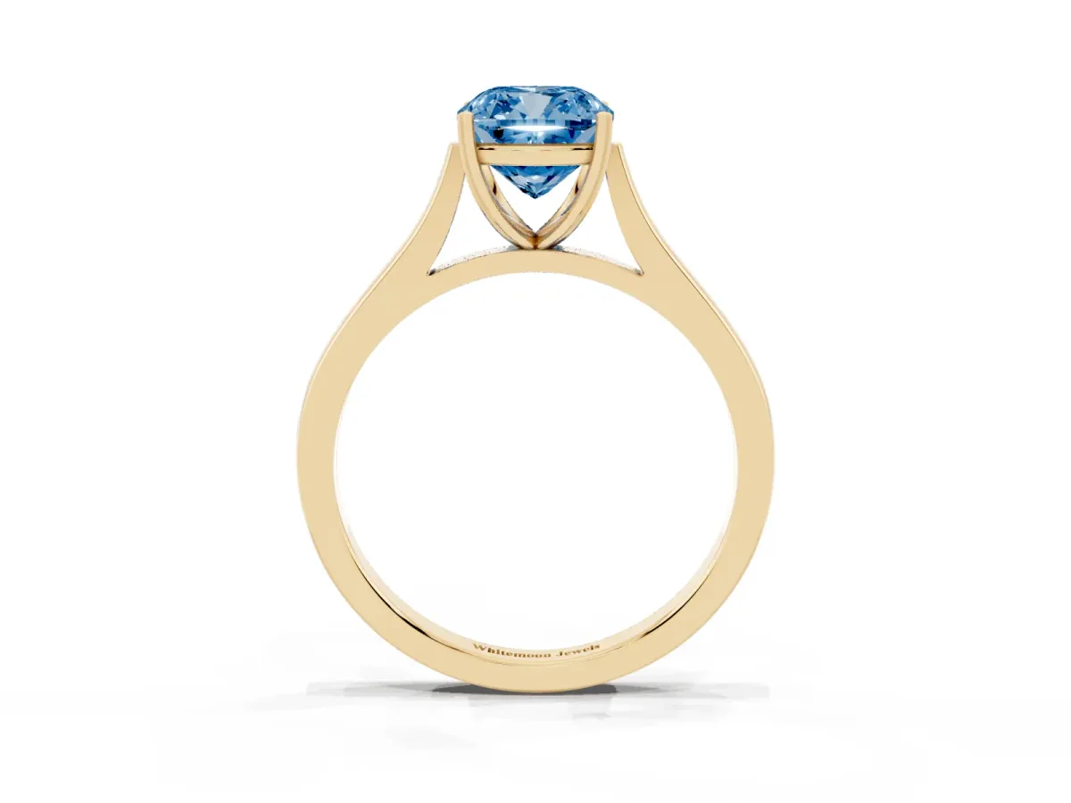 Fancy Blue Cushion Cut Solitaire Heart Prong Engagement Ring with Tapered Band Yellow gold