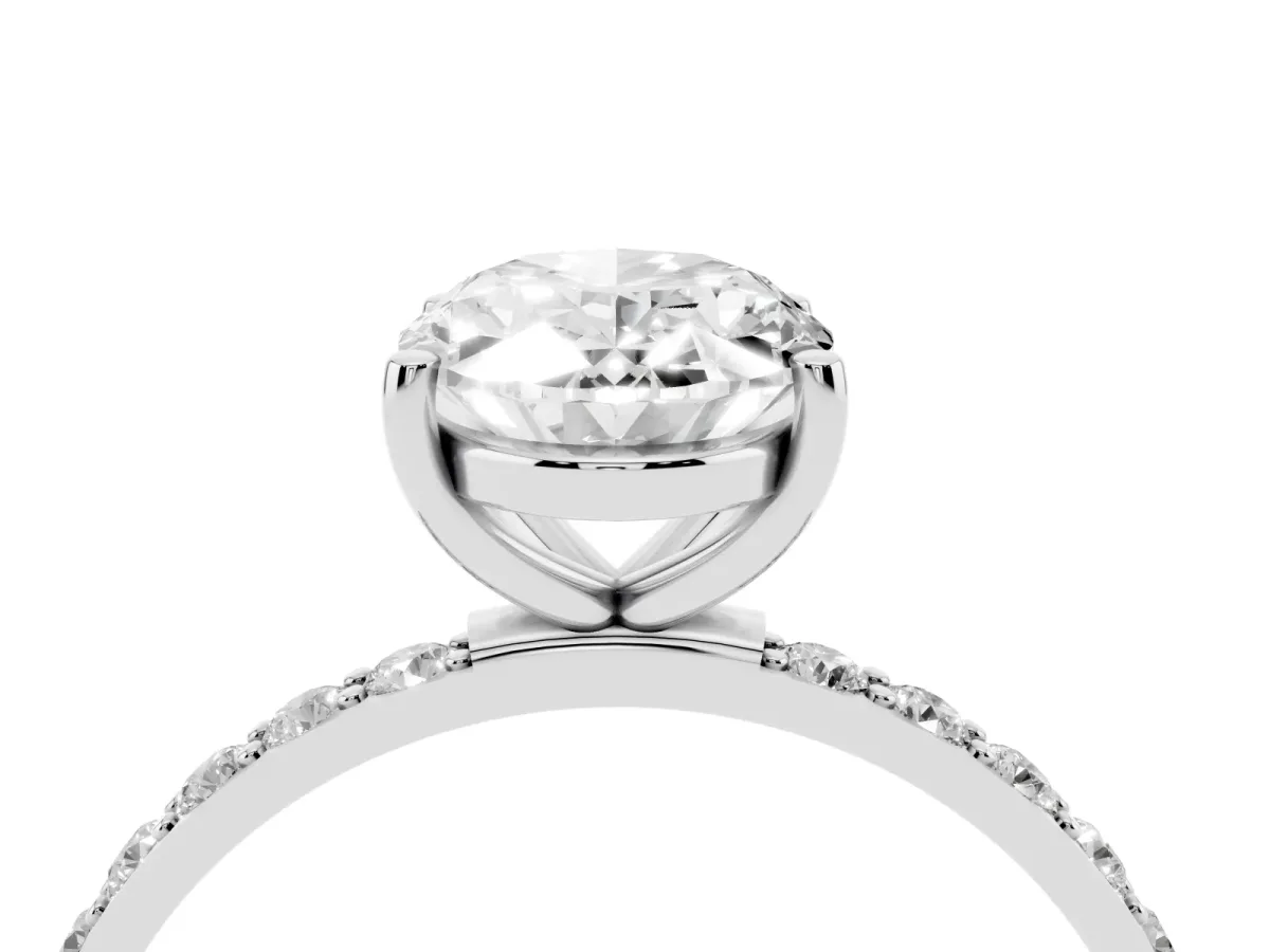 Oval Cut Diamond Solitaire Ring with Round Pavé Shoulders and Prong Setting Platinum