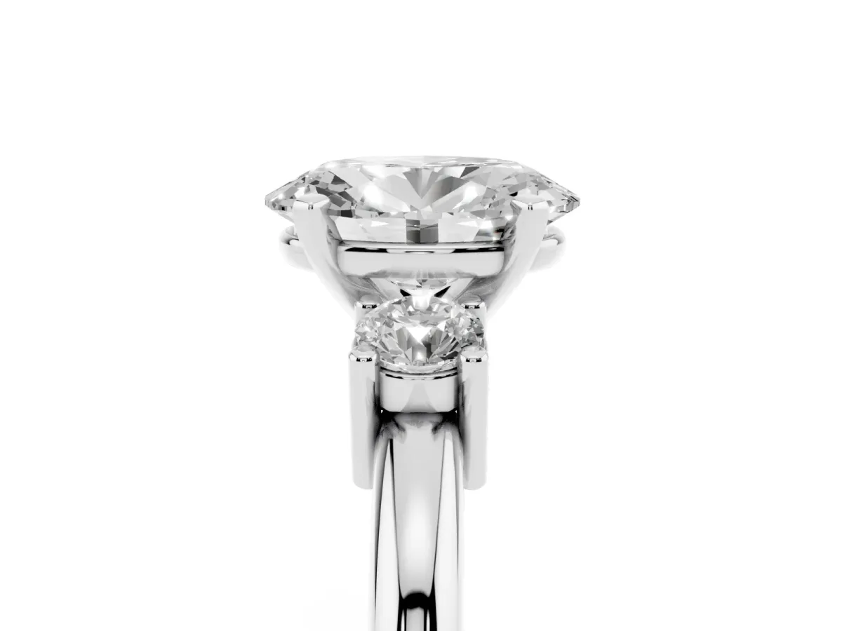 Three-Stone Oval Cut Cut Diamond Solitaire with Prong Setting and Classic Band Silver