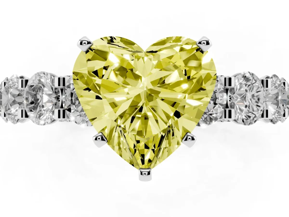 Fancy Yellow Heart Cut Diamond Side Stone Engagement Ring with Four-Prong Setting Silver