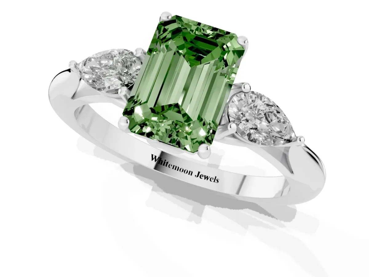 Fancy Green Three-Stone Emerald Cut Brilliant Diamond Solitaire Ring with Tapered Band and Four-Prong Setting White gold
