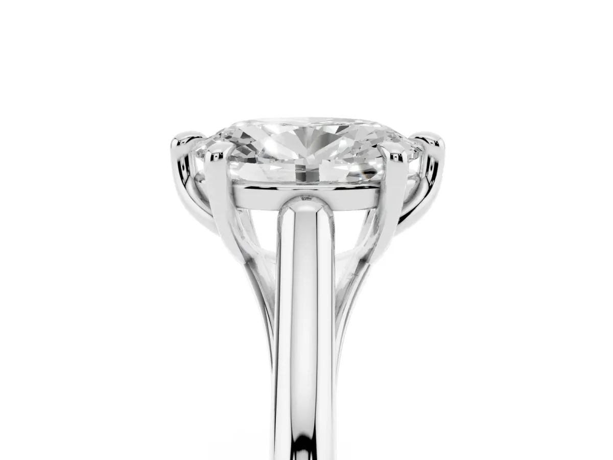 Oval Cut Solitaire Engagement Ring with Six-Prong Setting and Classic Band Silver