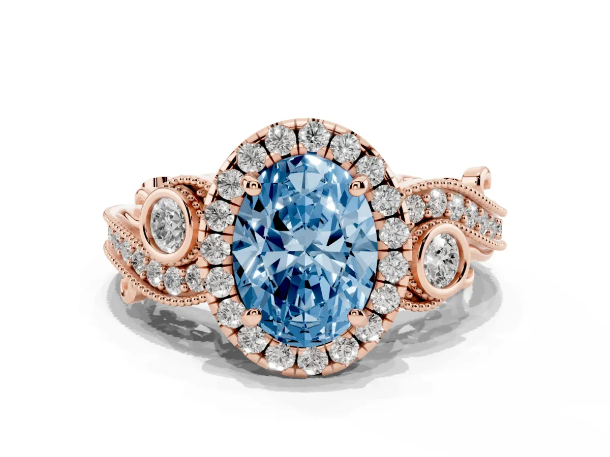 Fancy Blue Oval Cut Halo Diamond Ring with Milgrain and Bezel Accents on a Split Shank Band Rose gold