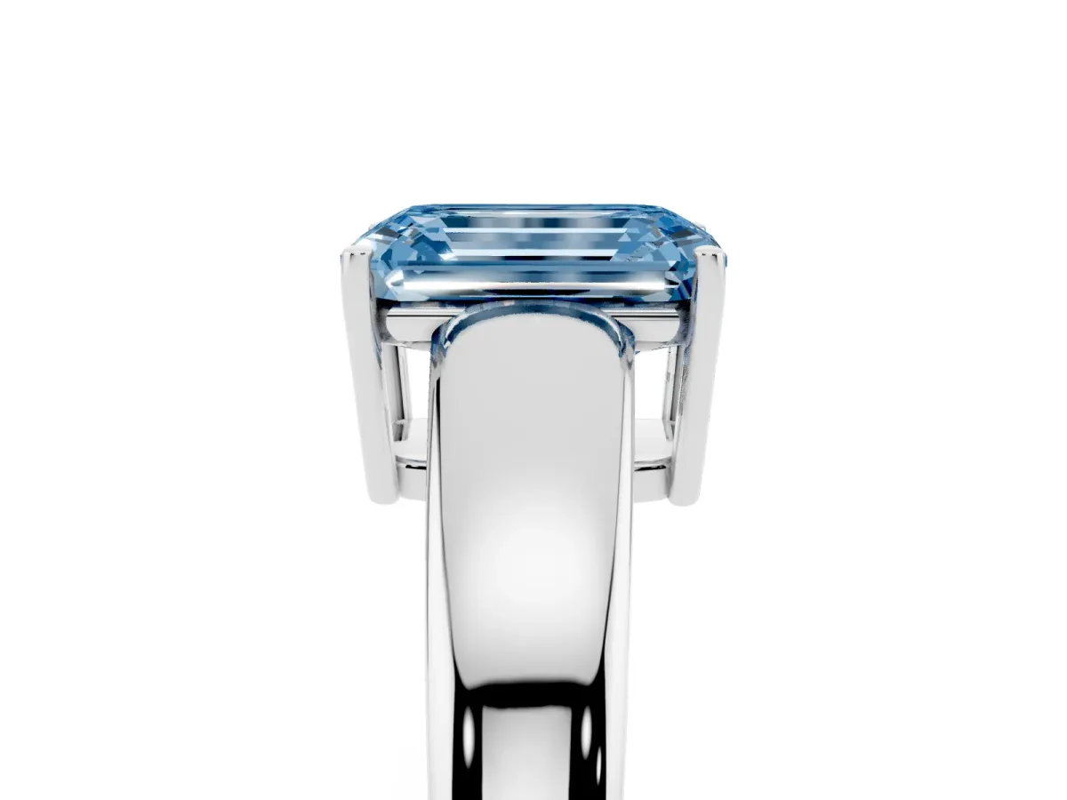 Fancy Blue Emerald Cut Solitaire Diamond Ring with Tapered Band and Four-Prong Setting Platinum