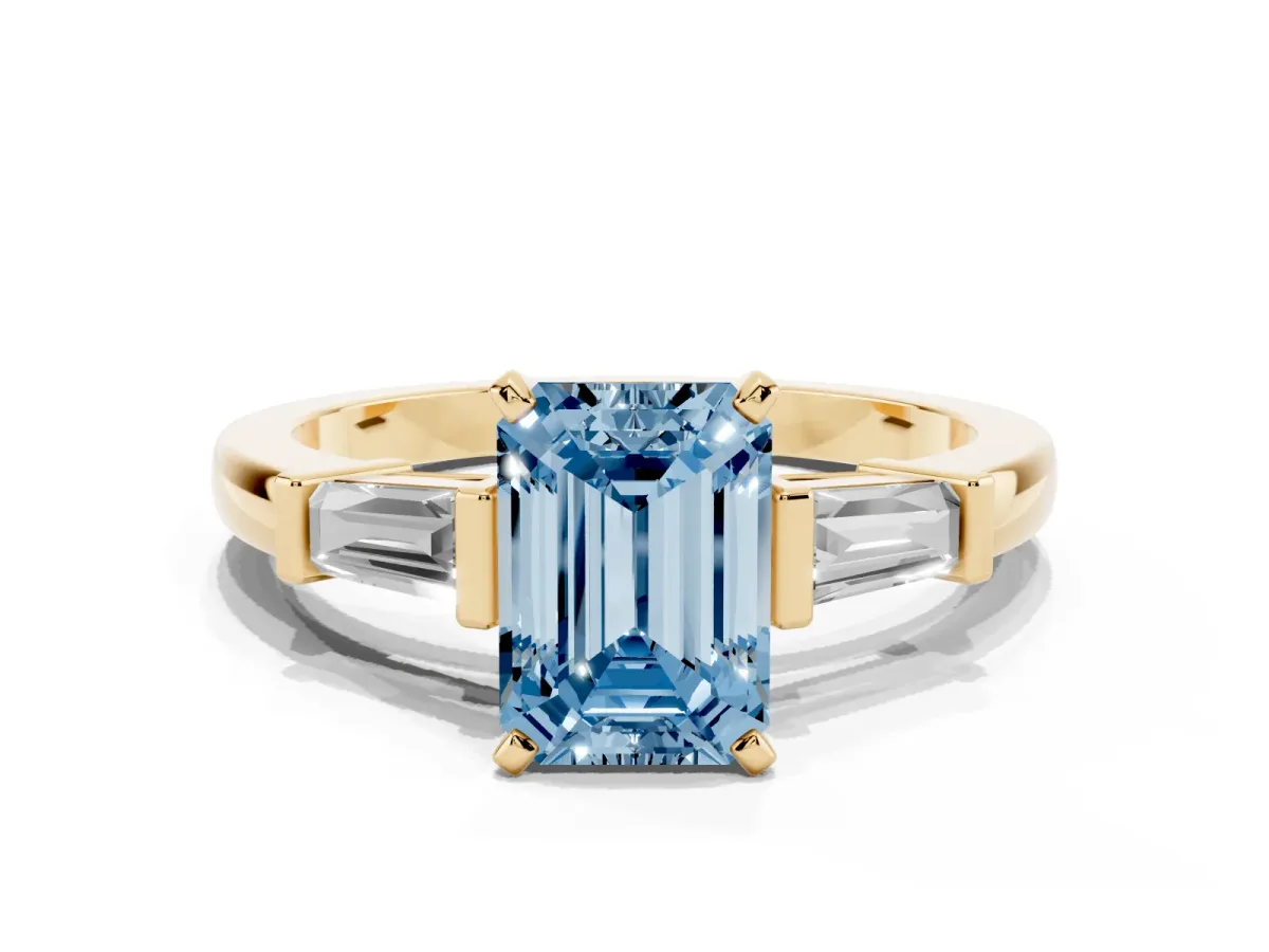Fancy Blue Emerald Cut Cut Diamond Solitaire Ring with Tapered Baguette Accents and Four-Prong Setting Yellow gold