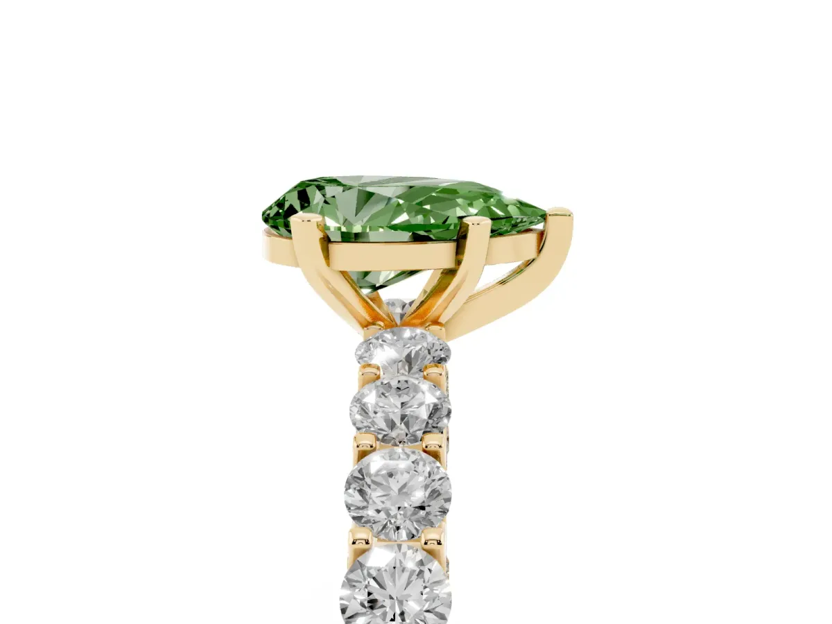 Fancy Green Pear Cut Diamond Solitaire Ring with Shared Prong Pavé Band and Four-Prong Setting Yellow gold