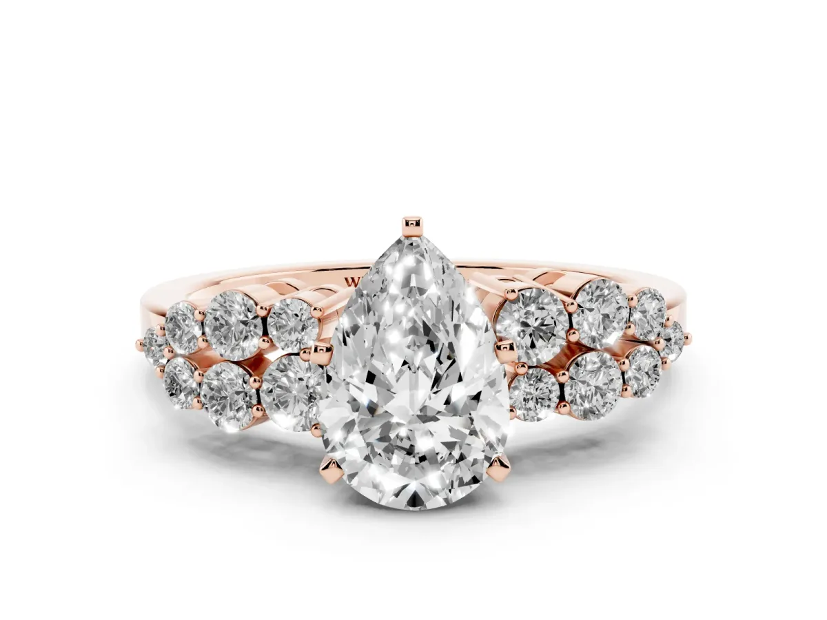 Pear Cut Cluster Diamond Engagement Ring with Pavé Band and Four-Prong Setting Rose gold
