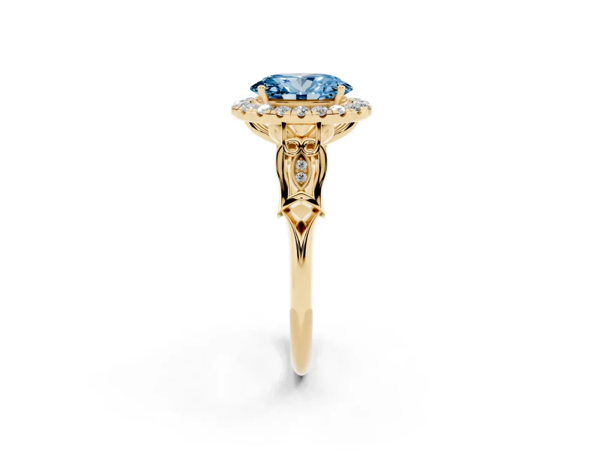 Fancy Blue Oval Cut Halo Diamond Engagement Ring with Filigree Band and Four-Prong Setting Yellow gold