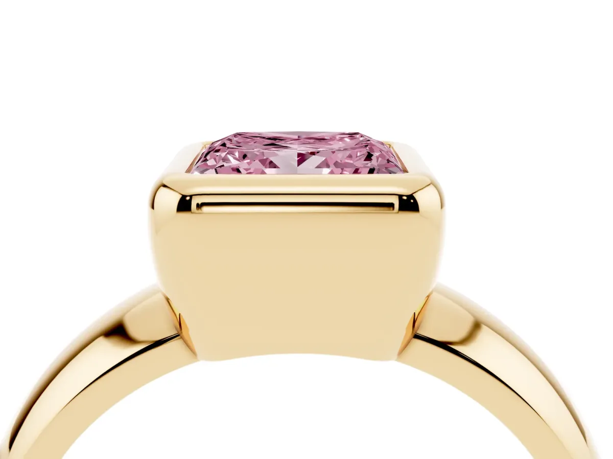 Fancy Pink Bezel Set Princess Cut Solitaire Ring with Wide Band Yellow gold