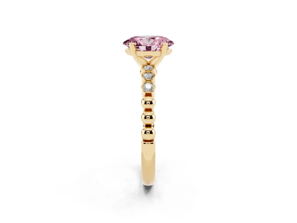 Fancy Pink Oval Cut Solitaire Bezel Accent Diamond Engagement Ring with Beaded Band and Four-Prong Setting Yellow gold